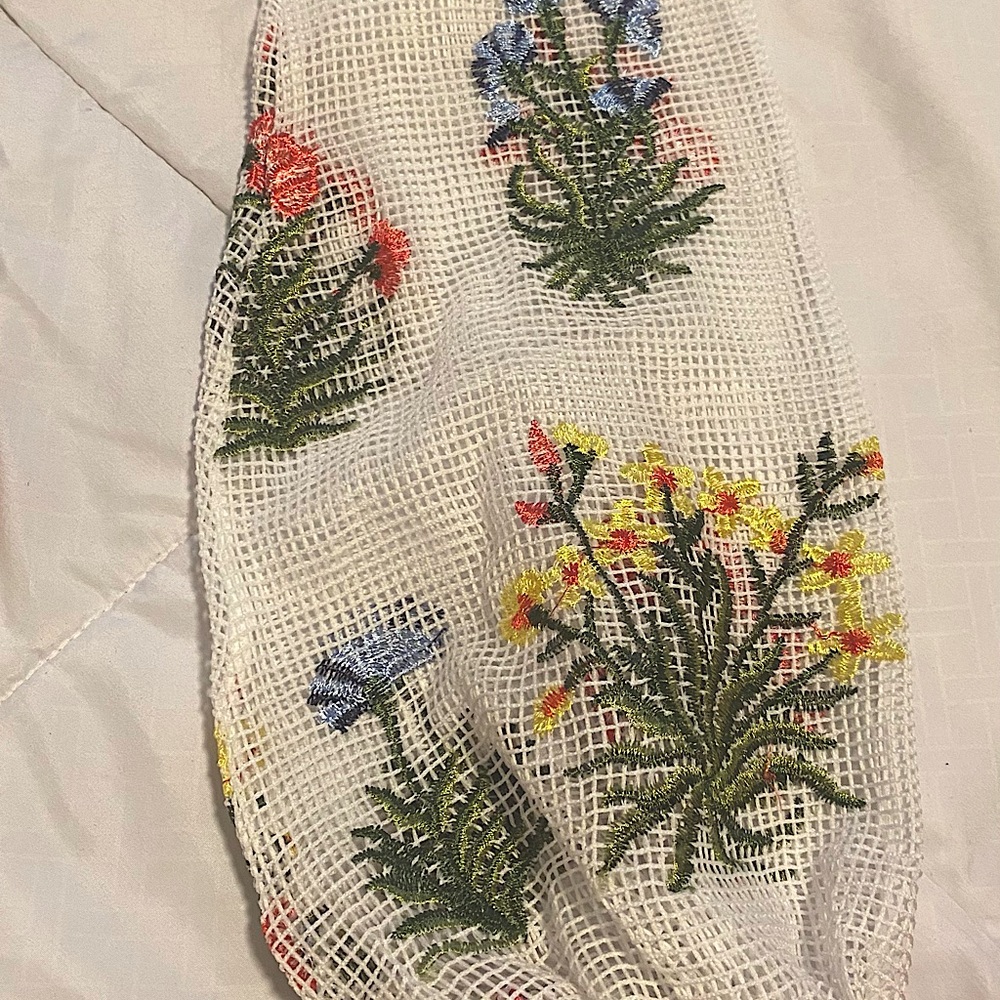 White dress with hand sewn design